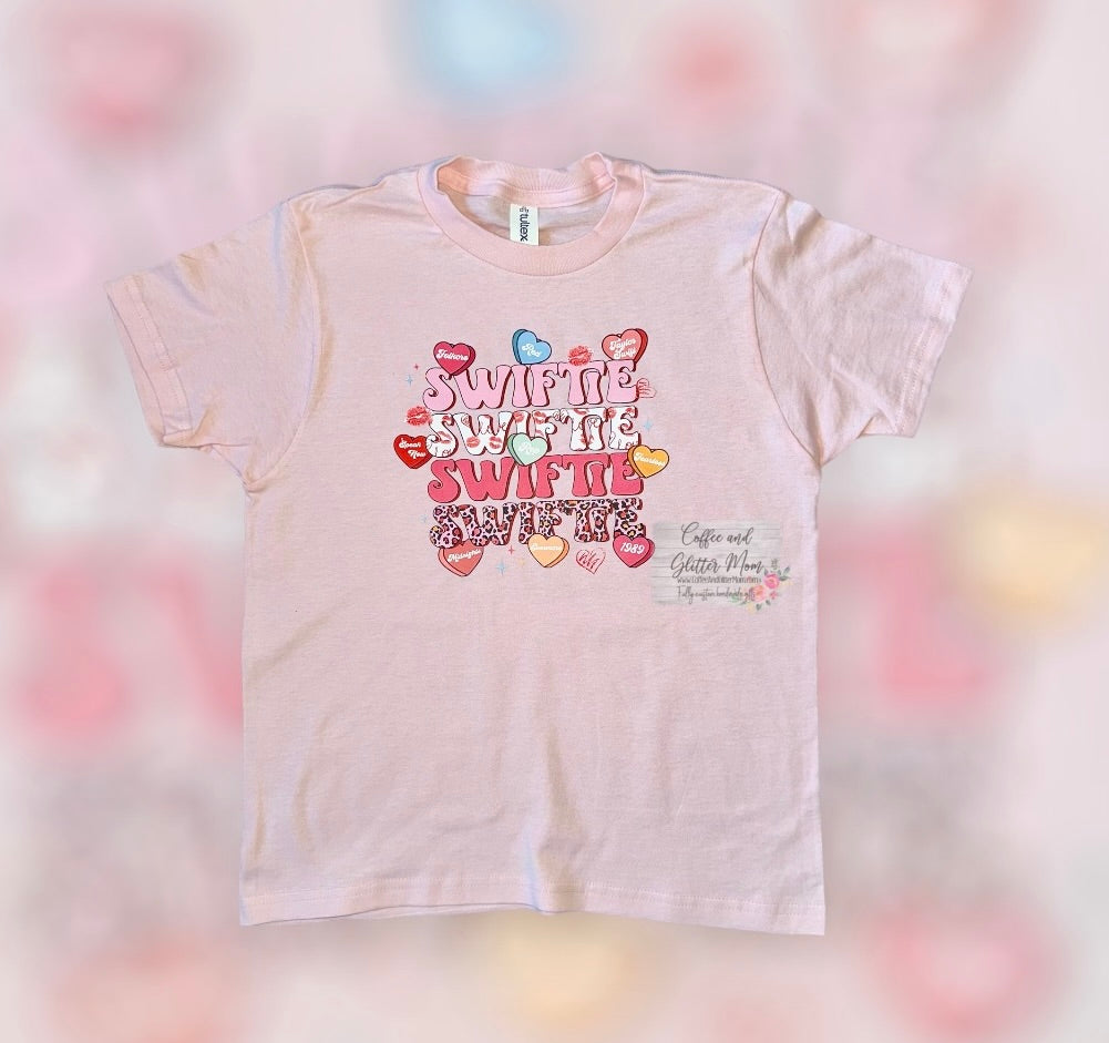 Swiftie Candy Hearts Light Pink Youth Medium Tee
