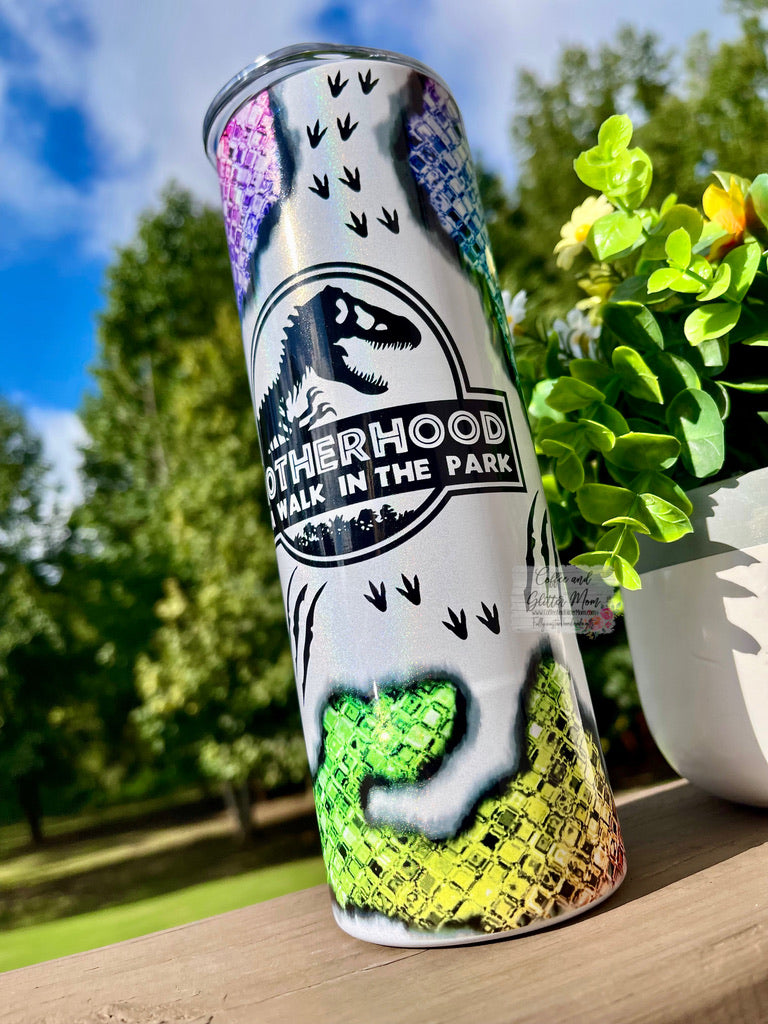 Motherhood is a Walk in the Park Dinosaur 20oz White Rainbow Skinny Tumbler