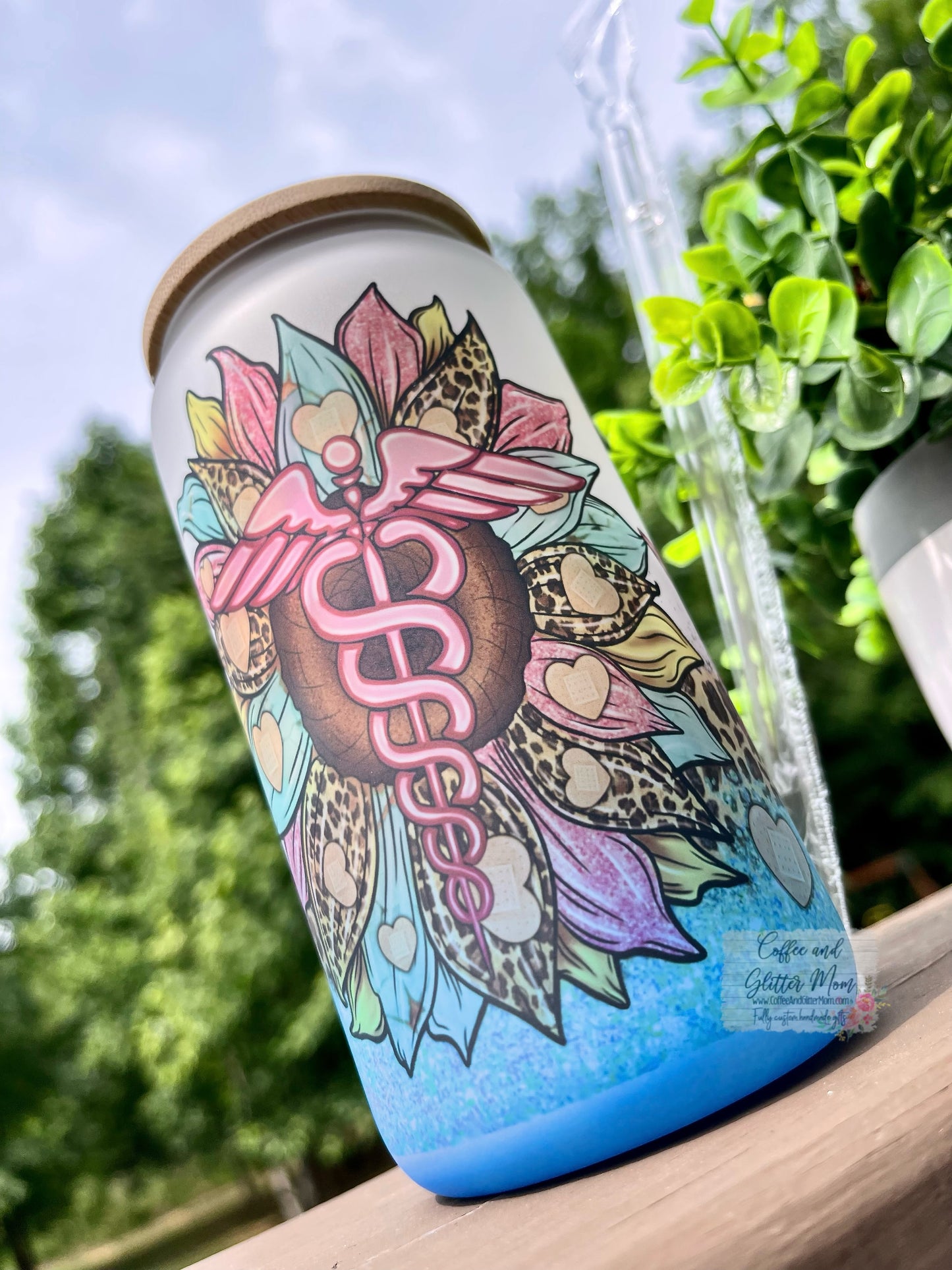 Caduceus Flower 16oz Blue Glass Can
