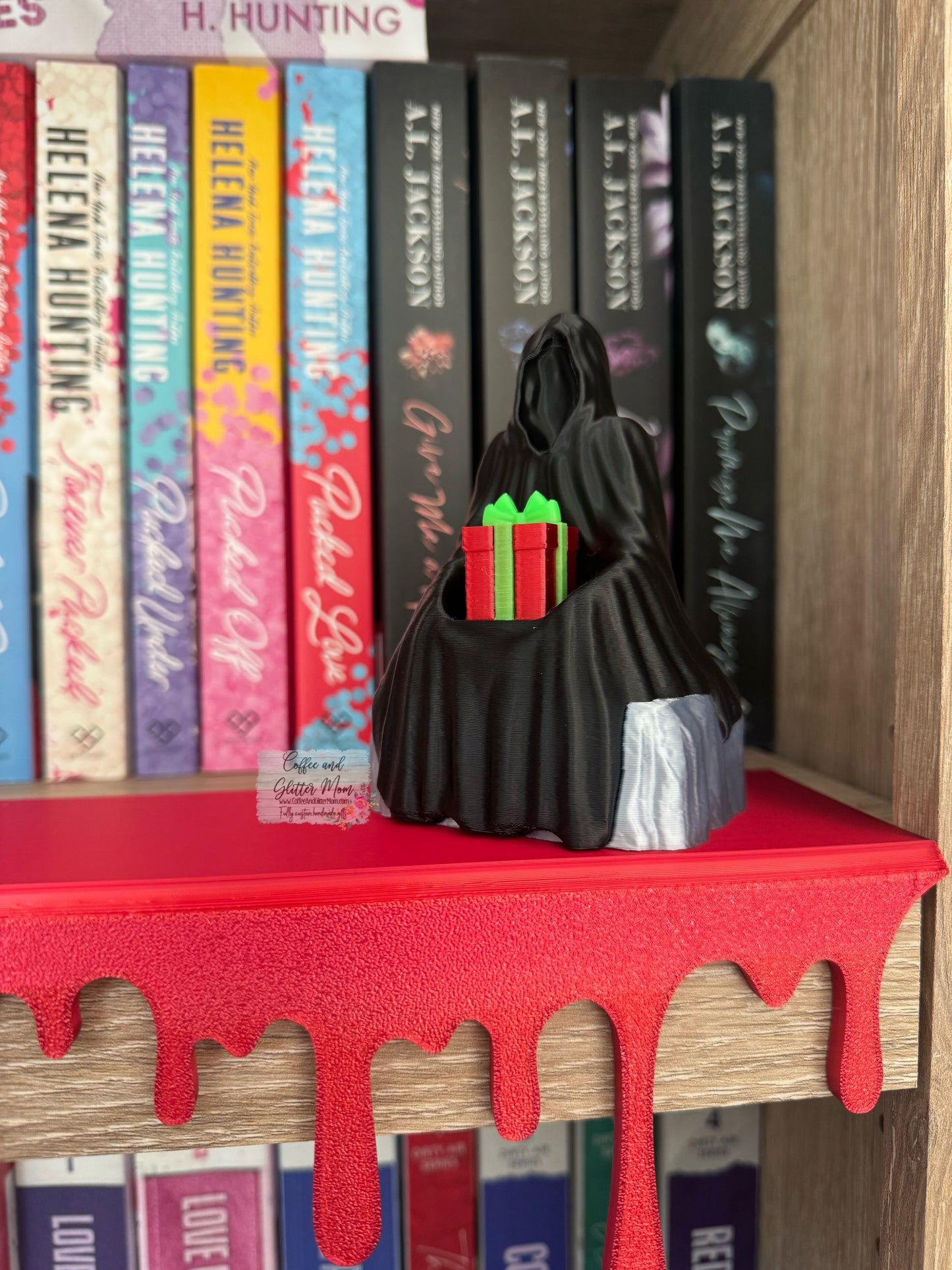 Festive Grim Bookshelf Decor