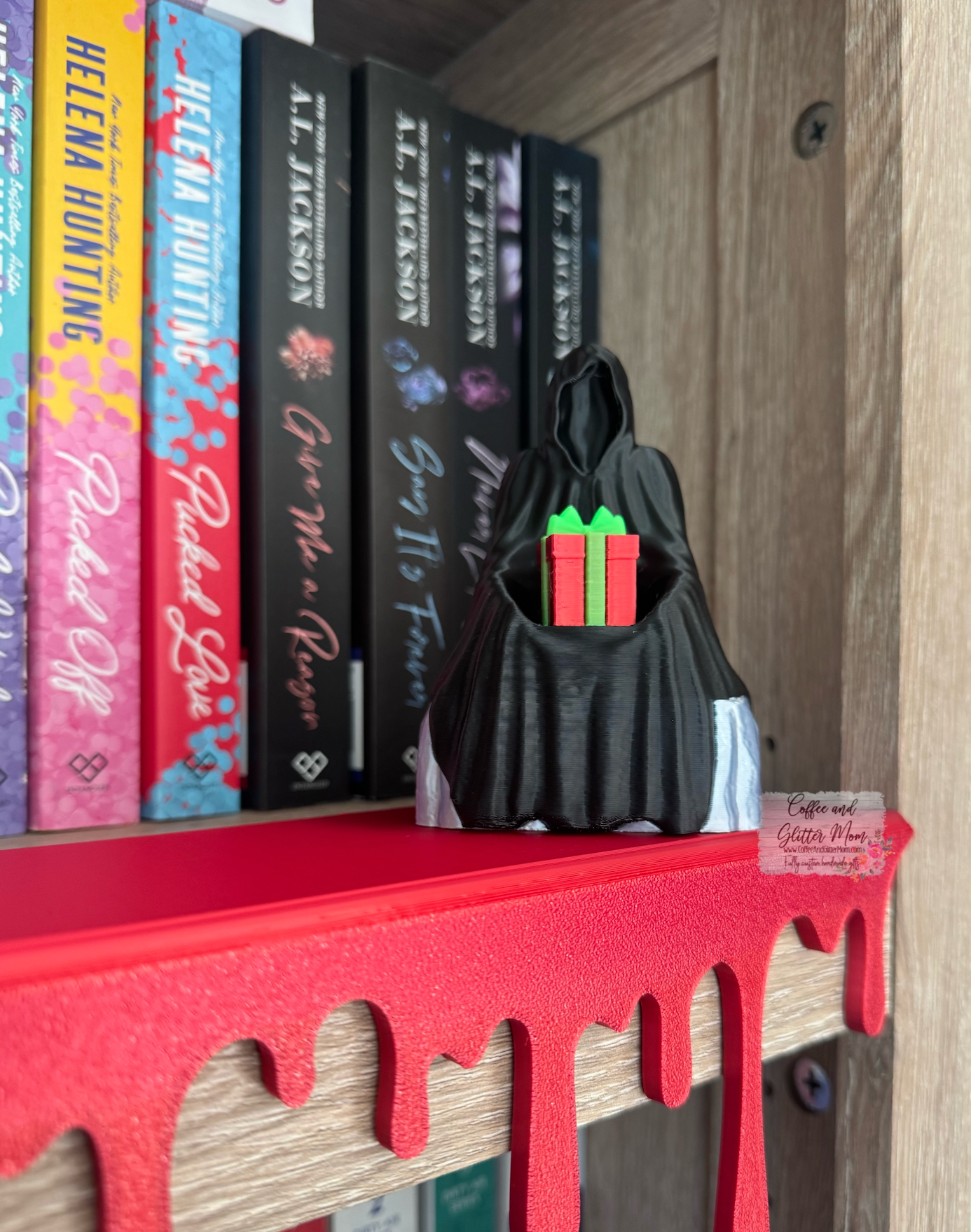 Festive Grim Bookshelf Decor